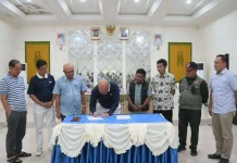 Syukri Saksikan Penandatanganan Perjanjian Kerja Pembangunan Huntap Pascabencana
